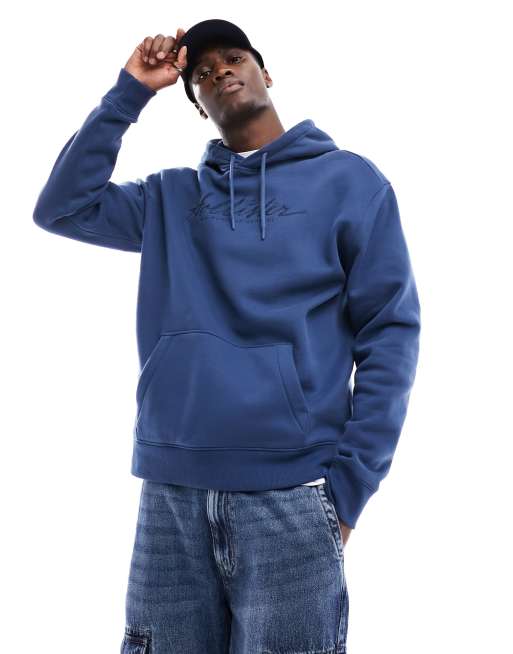 Hollister Blauer Kapuzenpullover mit lockerer Passform und gesticktem Brustlogo ASOS