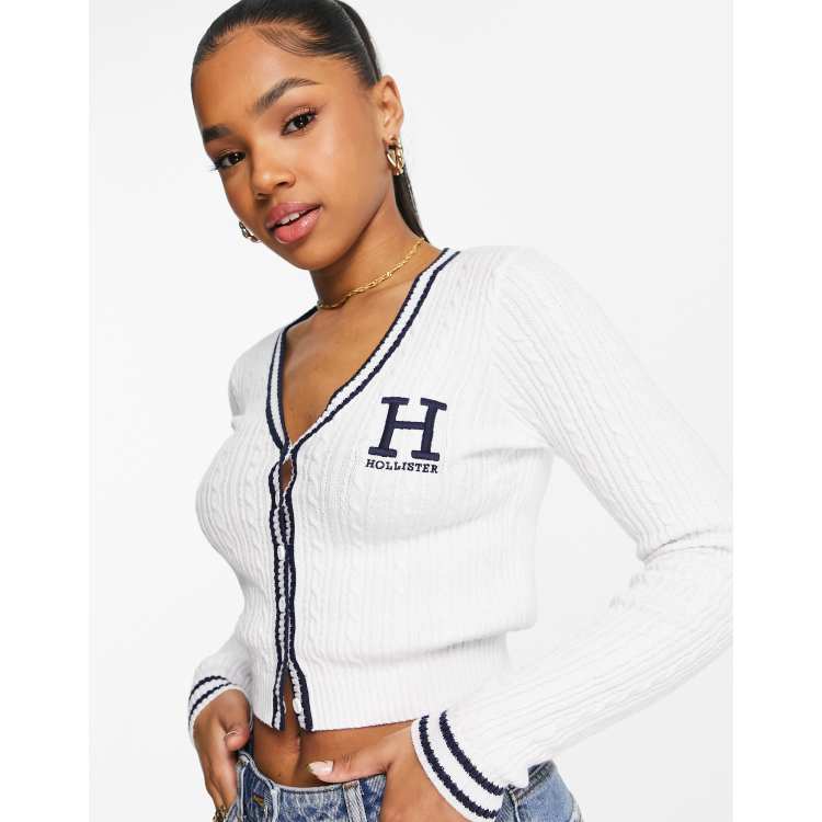 Hollister cable knit cropped varsity cardigan in white | ASOS