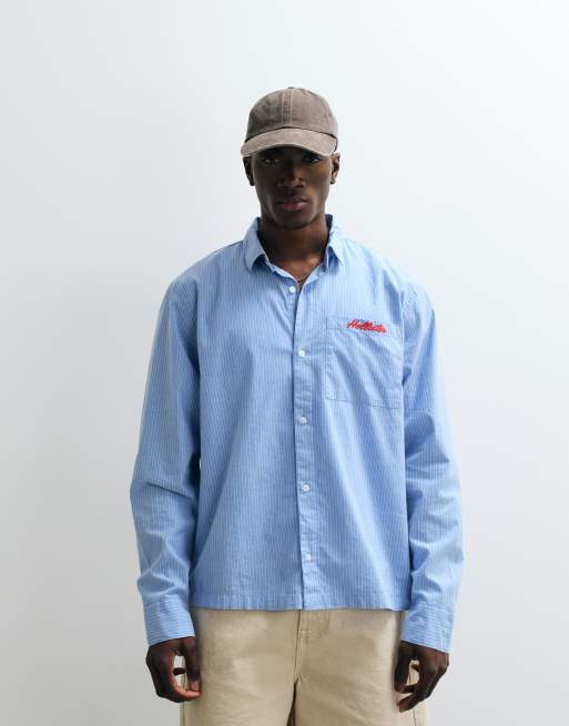 Hollister - Camicia a maniche lunghe in popeline blu con logo ricamato, 4 di 5