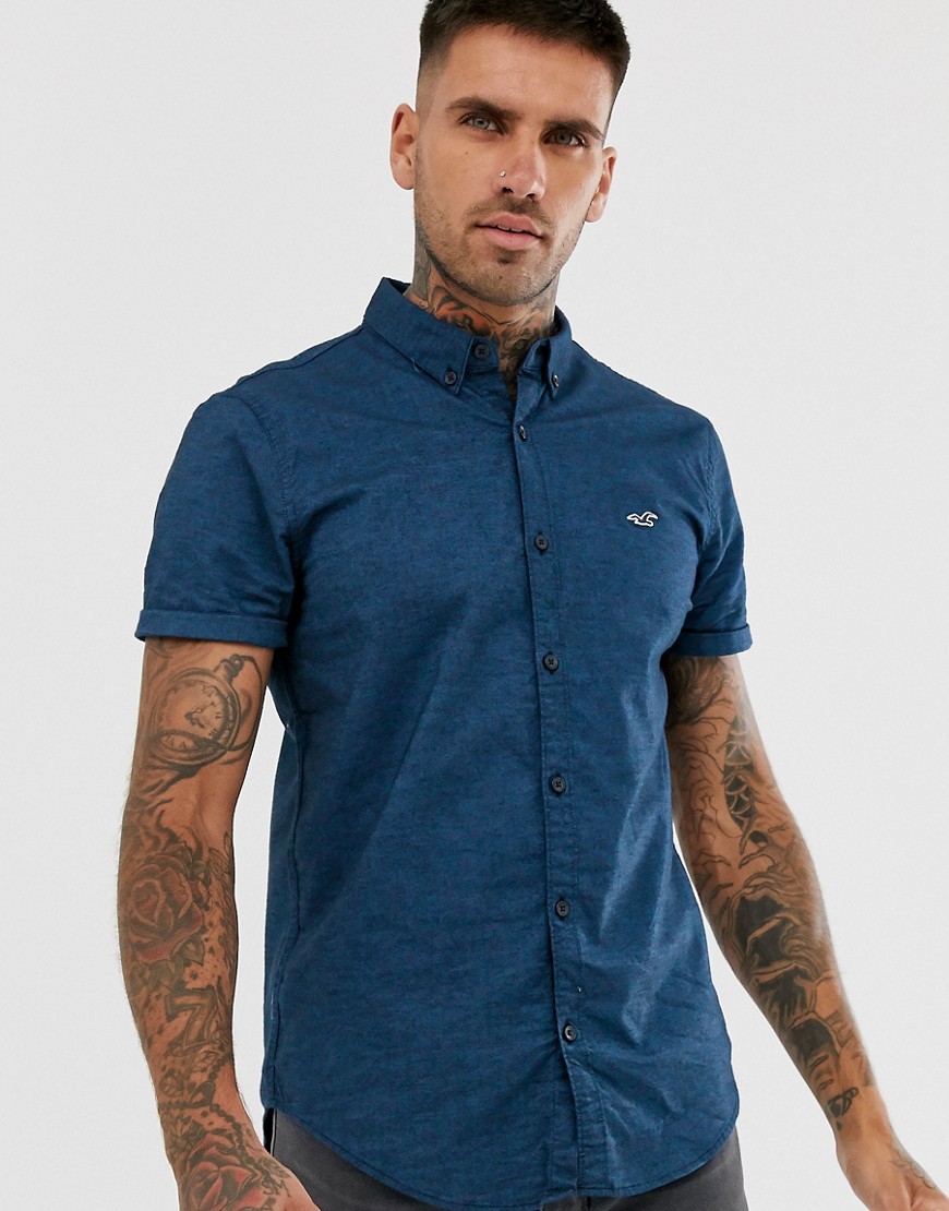 Hollister - Camicia Oxford slim a maniche corte con logo blu navy