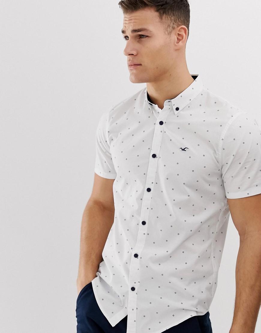 Hollister - Camicia Oxford slim bianca a maniche corte con logo e stampa geometrica-Bianco