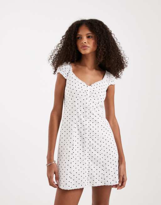 Hollister cap sleeve button up mini dress in white polka dots