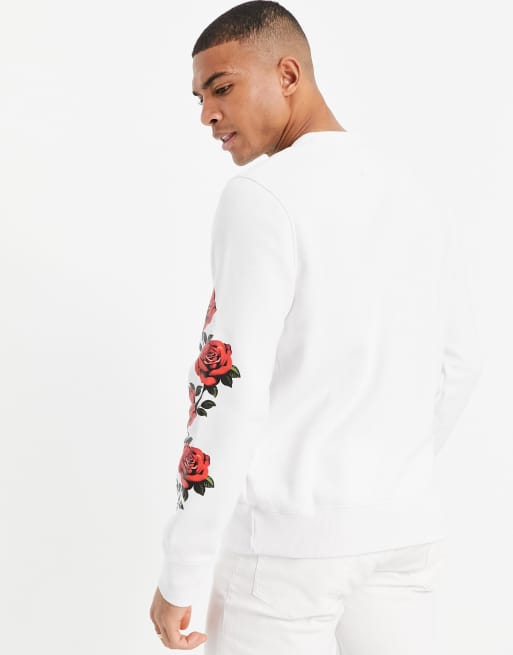 White hollister hoodie with roses on sale