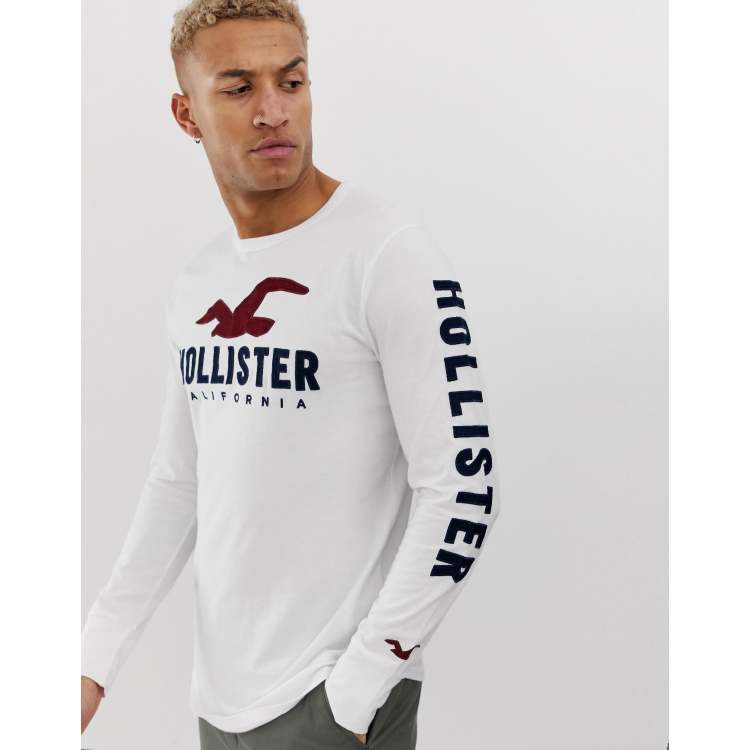 Hollister chest and sleeve logo long sleeve top in white