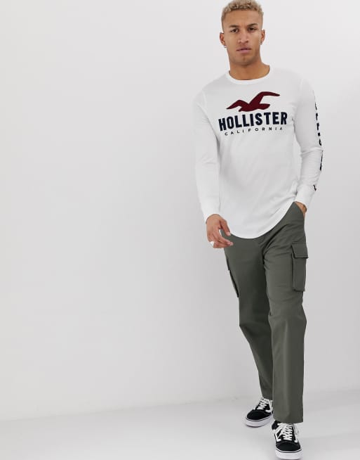 Hollister chest and sleeve logo long sleeve top in white