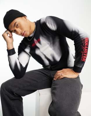 Hollister Hollister chest & arm logo acid wash long sleeve top in black and white