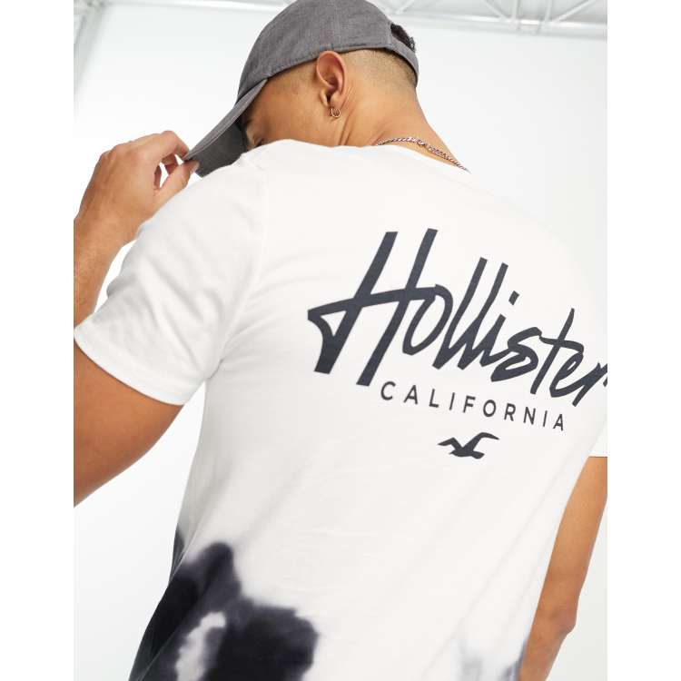 Hollister x ASOS exclusive centre logo ombre curved hem t-shirt in  black/green