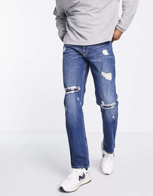 Hollister – Ciemnoniebieskie proste jeansy o dopasowanym kroju z rozdarciami z flanelowymi łatkami