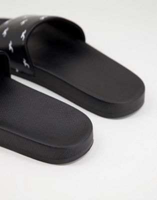 Chaussures, bottes et baskets Hollister - Claquettes avec logo sur l'ensemble - Noir