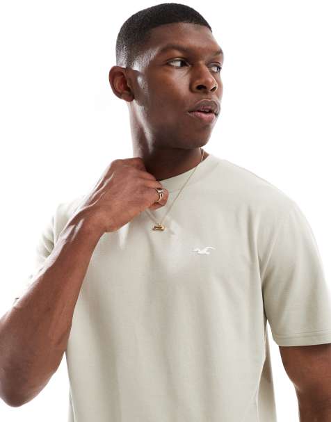 Hollister – Cooling – Kastiges T-Shirt in Hellgrün mit Markenlogo - view 1