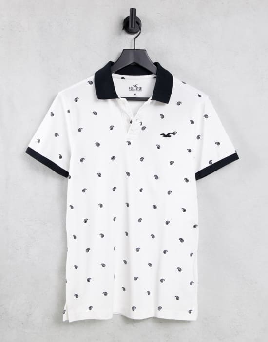https://images.asos-media.com/products/hollister-core-icon-logo-all-over-geo-print-pique-polo-contrast-collar-in-white/23922674-1-white?$n_550w$&wid=550&fit=constrain