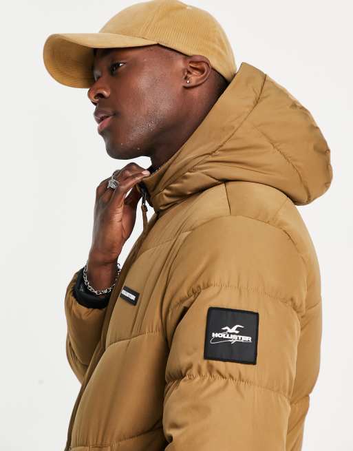 https://images.asos-media.com/products/hollister-cozy-lined-hooded-heavyweight-puffer-jacket-in-brown/201554758-2?$n_640w$&wid=513&fit=constrain