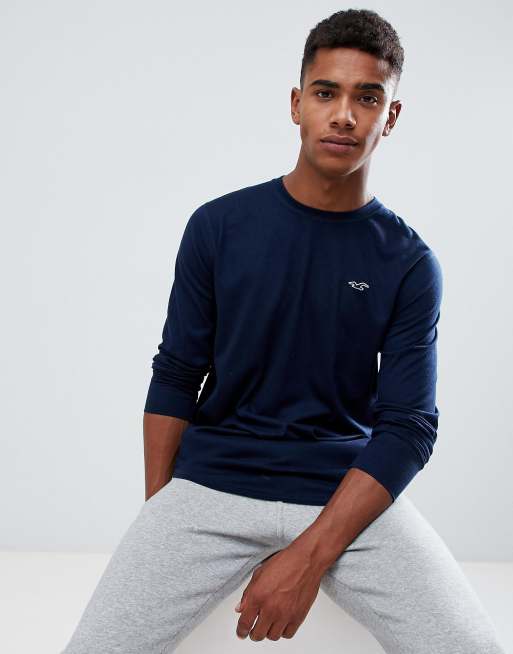 Hollister crew neck long sleeve top slim fit seagull logo in navy ASOS