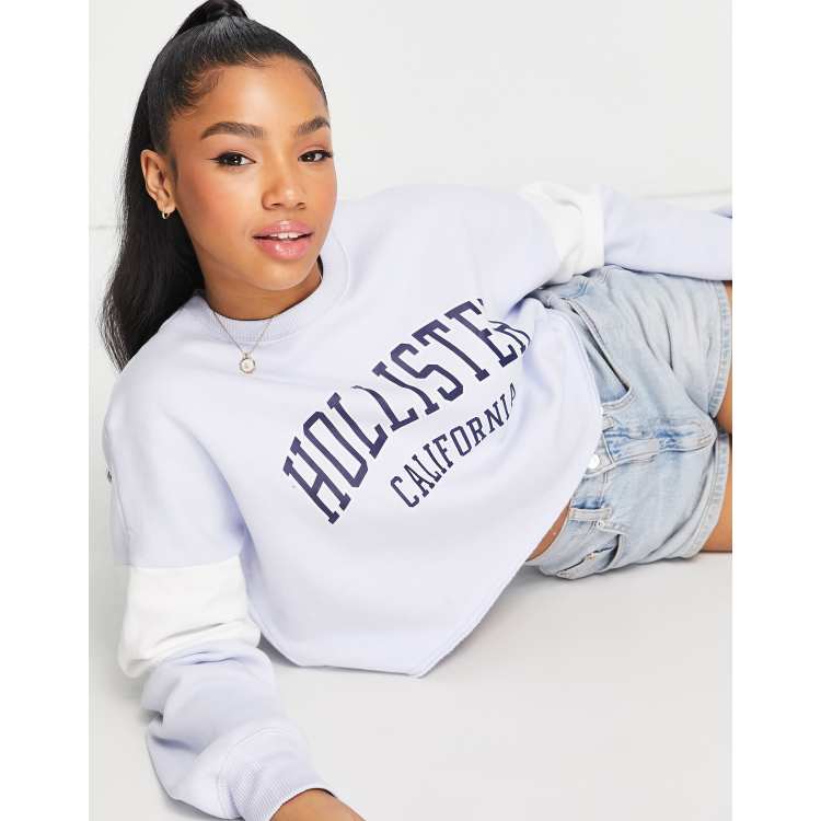 Hollister cropped logo print sweat in light blue