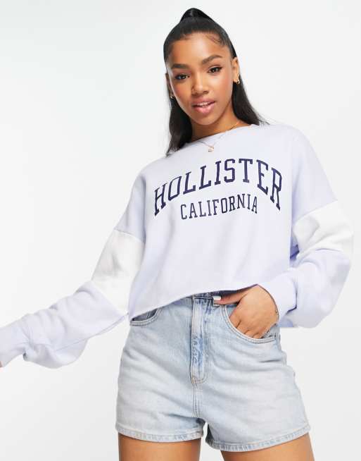 Hollister cropped logo print sweat in light blue ASOS