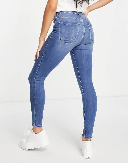 Hollister curvy skinny in mid wash |