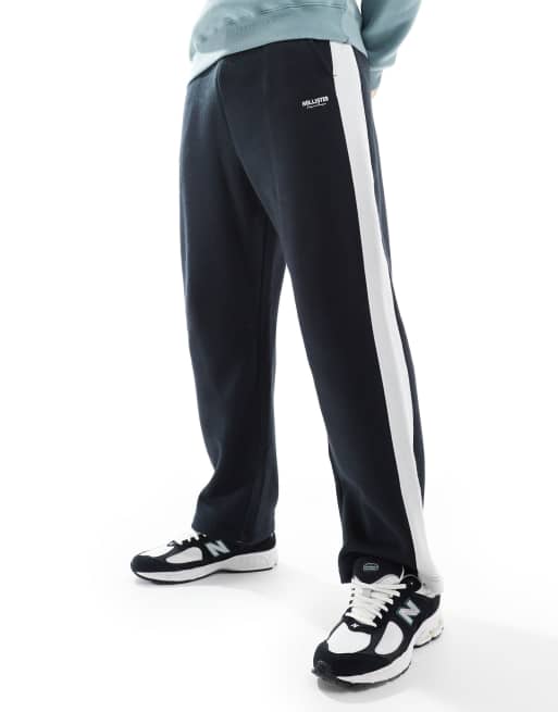 Hollister – Czarne, obszerne joggersy w stylu varsity z lampasami