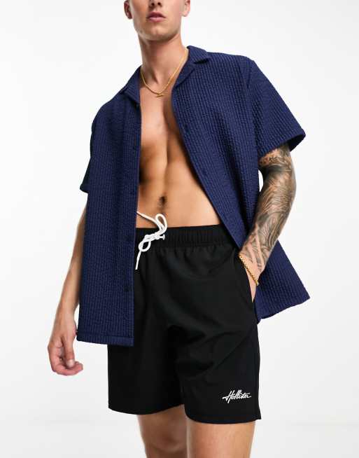 Hollister – Czarne szorty kąpielowe o długości 7 cali z logo
