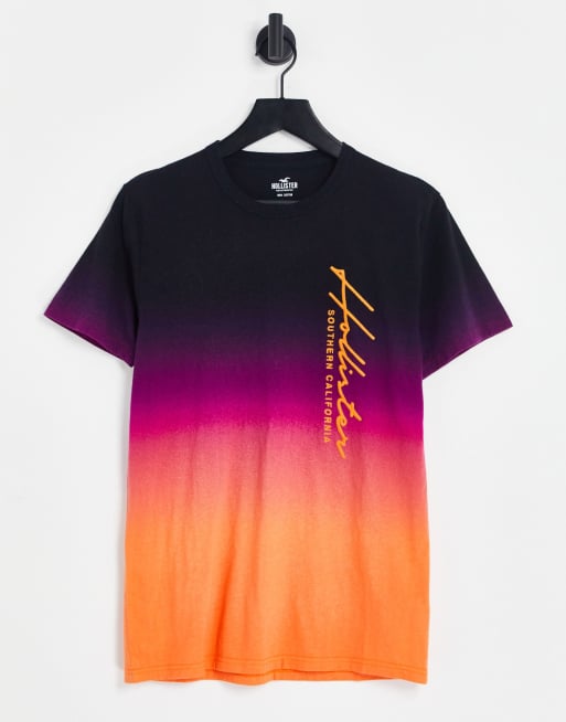 Hollister - Dip-dye T-shirt met geschreven logo aan de zijkant in roze en oranje met kleurverloop
