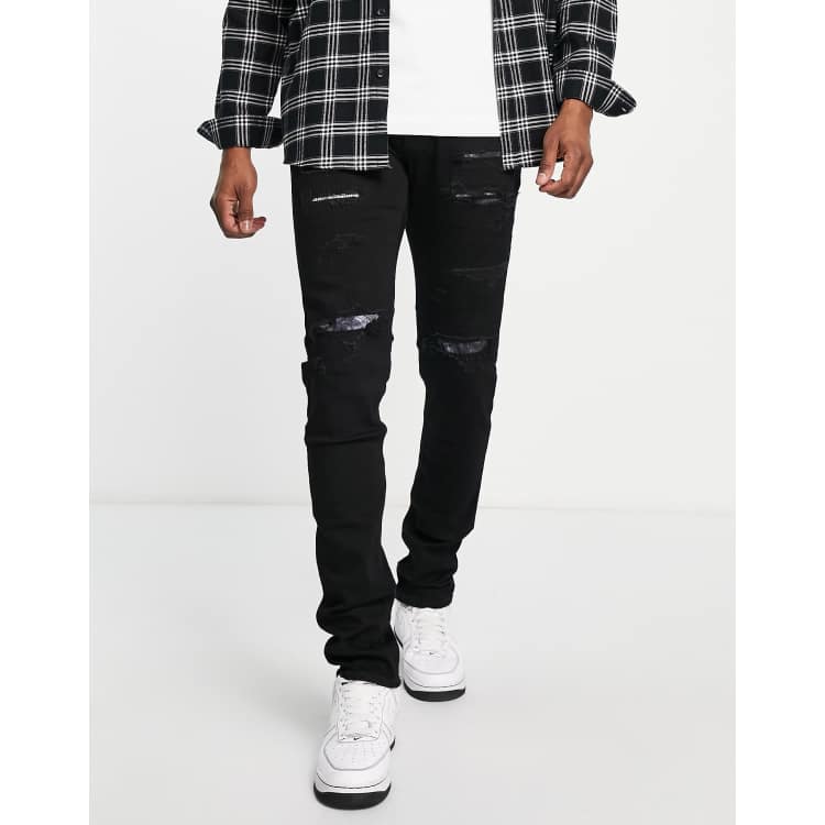 Hollister distressed and repair patch skinny fit jeans in black