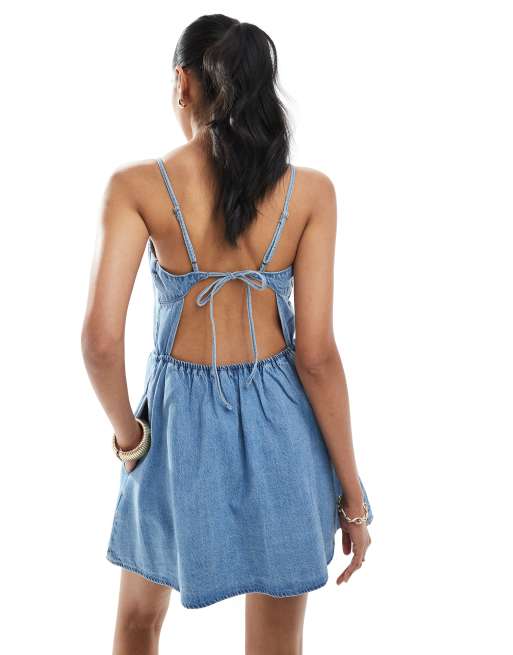 Hollister drop waist sleeveless tie back mini dress in light wash denim |  ASOS