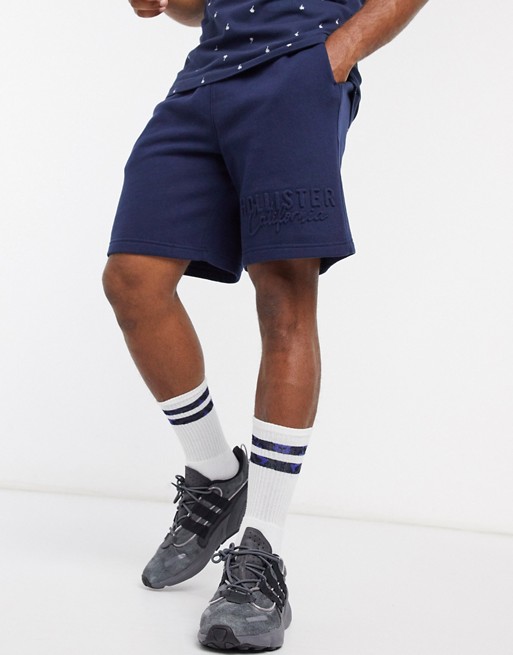 Hollister embossed logo sweat shorts in navy