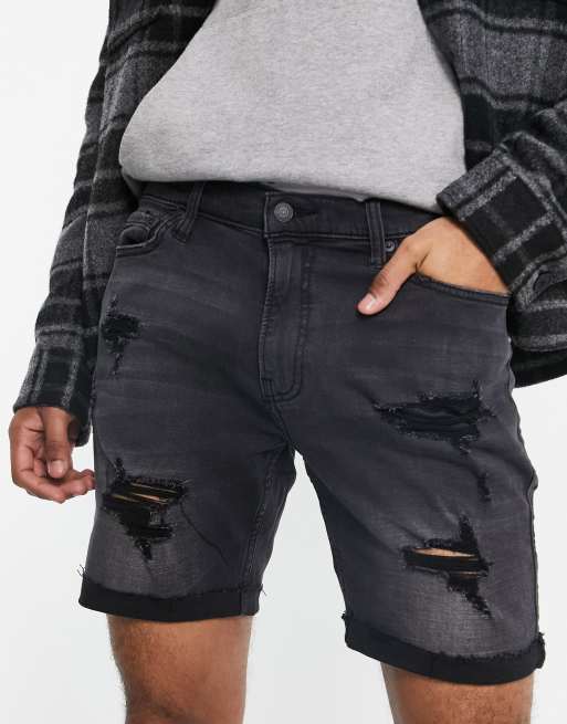 Hollister Eng geschnittene Jeansshorts im Used Look in Schwarz