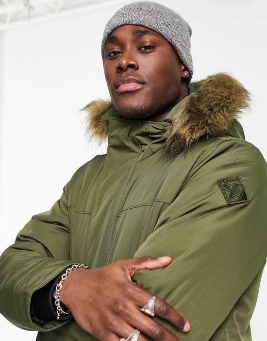https://images.asos-media.com/products/hollister-everyday-faux-fur-trim-hooded-parka-coat-in-green/201554596-4?$n_550w$&wid=550&fit=constrain