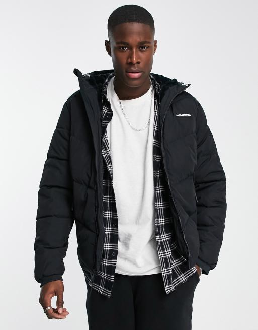 Hollister faux fur lined hooded heavyweight puffer jacket in black | ASOS