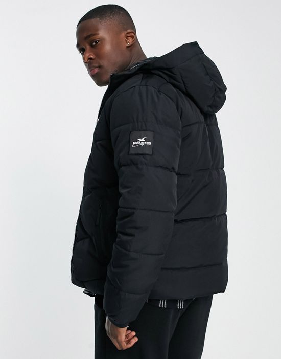 https://images.asos-media.com/products/hollister-faux-fur-lined-hooded-heavyweight-puffer-jacket-in-black/201554733-2?$n_550w$&wid=550&fit=constrain