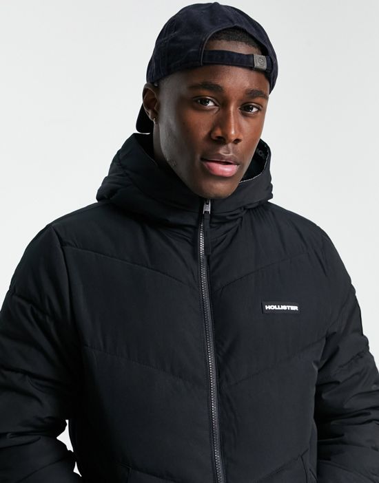 https://images.asos-media.com/products/hollister-faux-fur-lined-hooded-heavyweight-puffer-jacket-in-black/201554733-3?$n_550w$&wid=550&fit=constrain