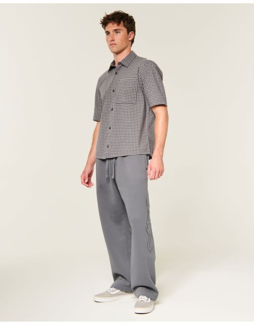 Hollister feel good embroidered graphic baggy sweatpants in dark gray, 1 of 4