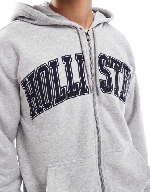 Hollister Felpa con cappuccio comoda grigio melange con logo college e zip ASOS