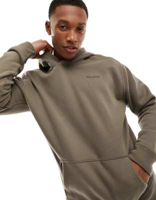 Hollister - Felpa con cappuccio comoda marrone con tasca con zip e logo piccolo