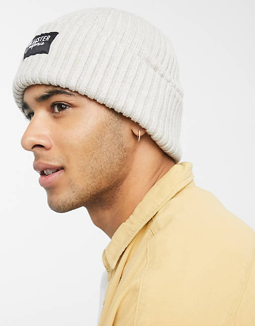 Hollister fisherman ribbed beanie in cream with logo | ASOS