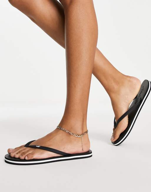 Hollister flip flops in black ASOS