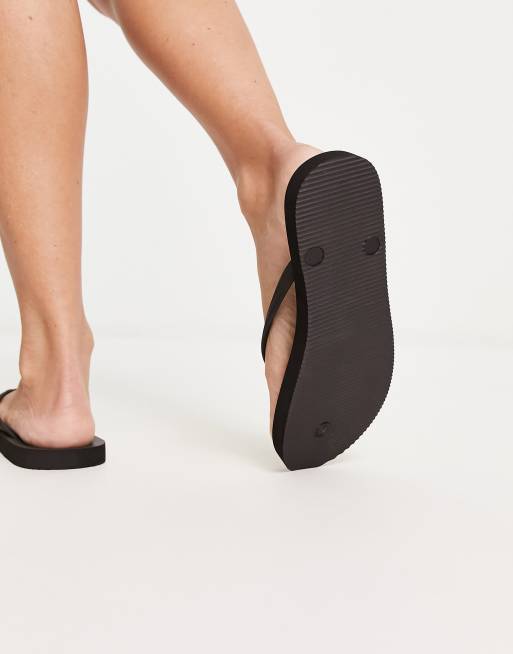 Hollister flip flops in black