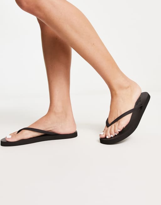 Hollister black flip flops online