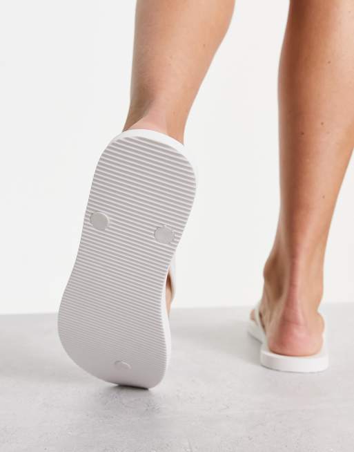 Hollister flip flops in white ASOS