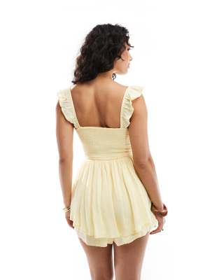 Hollister flutter sleeve cutout romper in lemon polka dot