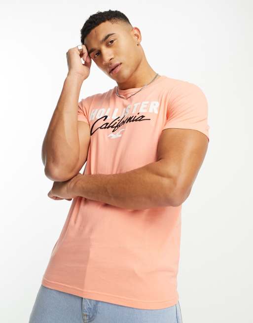 Hollister – Funktions-T-Shirt in Korallenrosa mit Logo