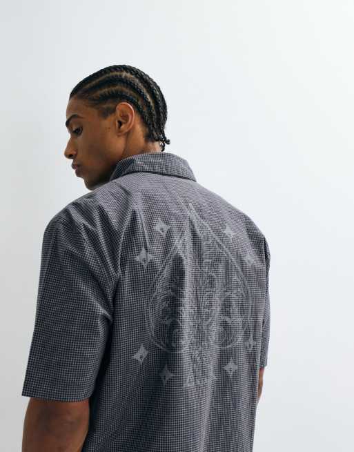 Hollister graphic short sleeve shirt in black micro check