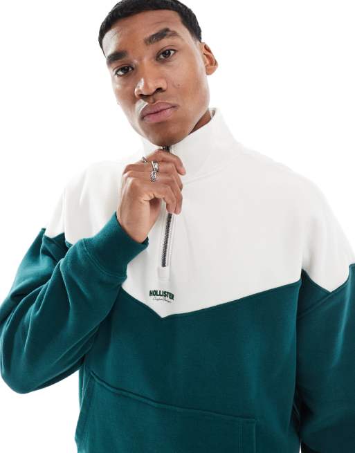 Hollister – Grön och flerfärgad sweatshirt med boxig passform, kontrasterande logga i collegestil och kvartslång dragkedja