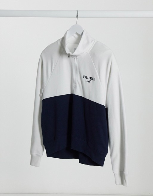 Hollister half zip sweat top in white and blue
