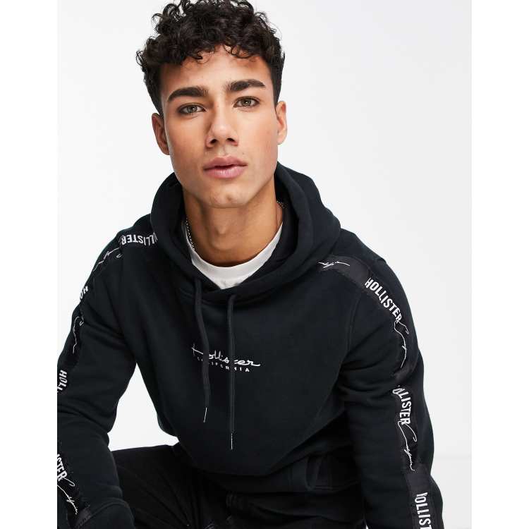 Hollister Overhead Hoodie With Sleeve & Back Logo in Rhubarb, ASOS