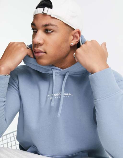Hollister hoodie in blue with chest script logo