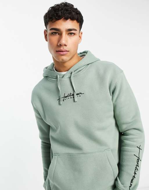 Hollister hoodie in green with script logo