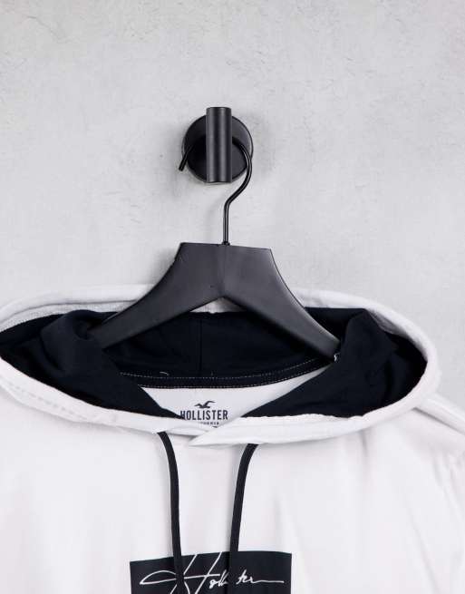 Black and deals white hollister hoodie