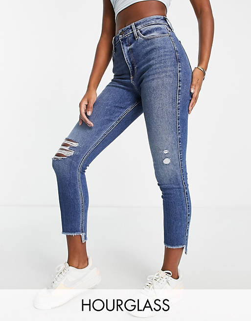 Hollister - Hourglass - Jeans met kniescheuren en hoge taille in blauw 