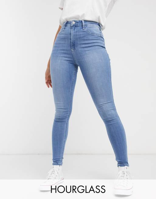 Hollister Hourglass skinny jeans in midwash blue | ASOS